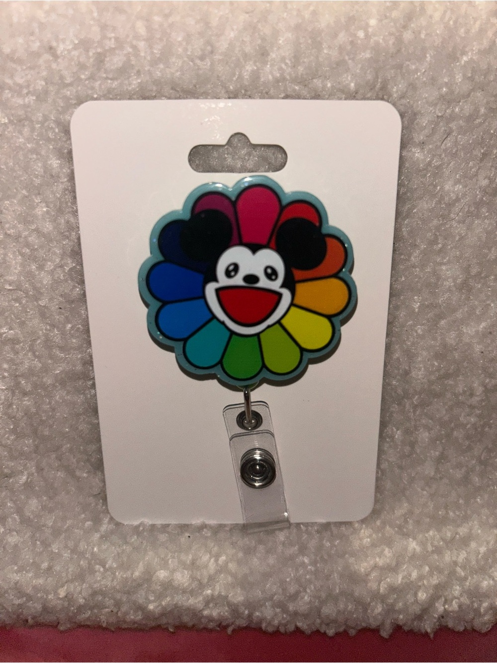 Multicolor Flower Smiley Badge Reel